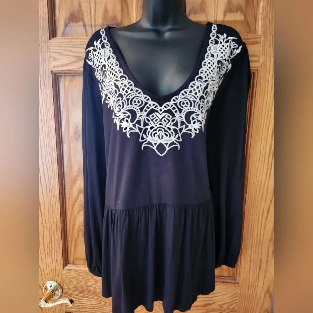 Elegant Black Dress with White Lace Detail